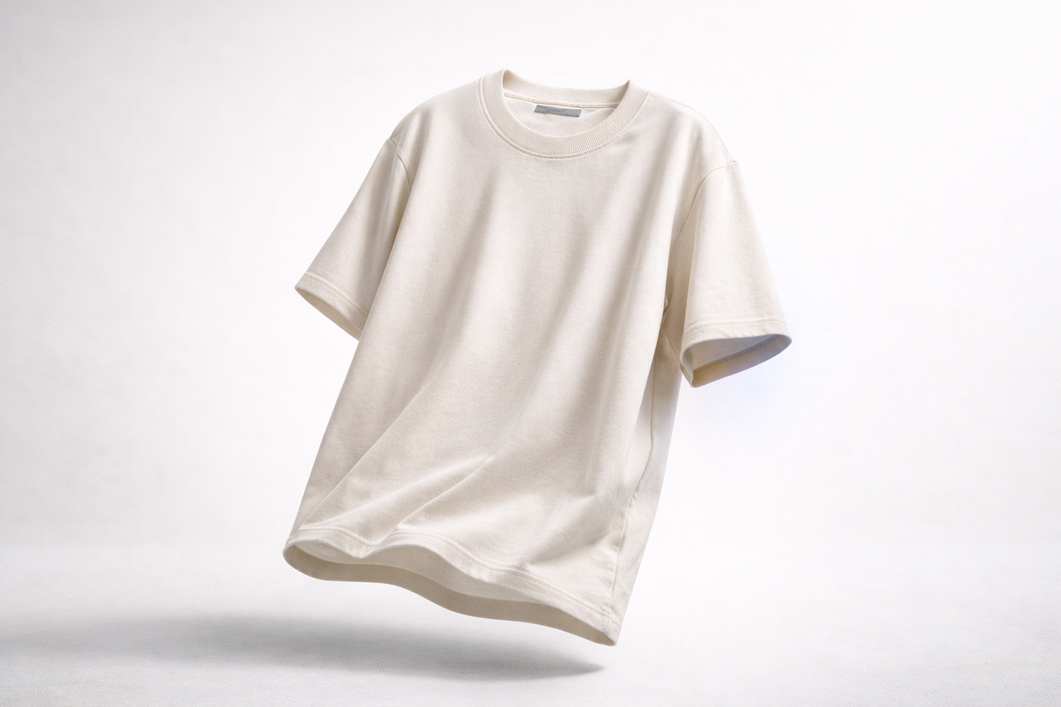 Beige t-shirt on a light gray background
